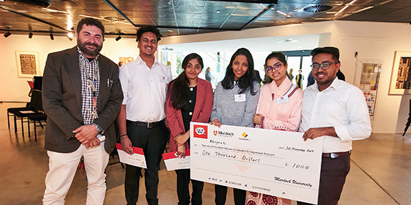 Think Big Competition winners, group of students with novelty sized cheque