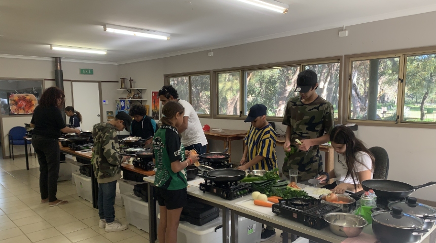 Aboriginal children participate in a cooking class