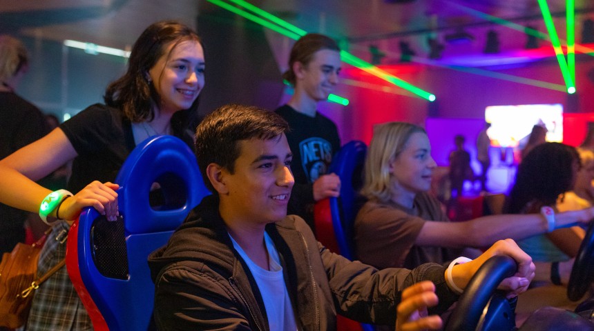 Teens playing games in the Esports area at Sound On Festival 2021