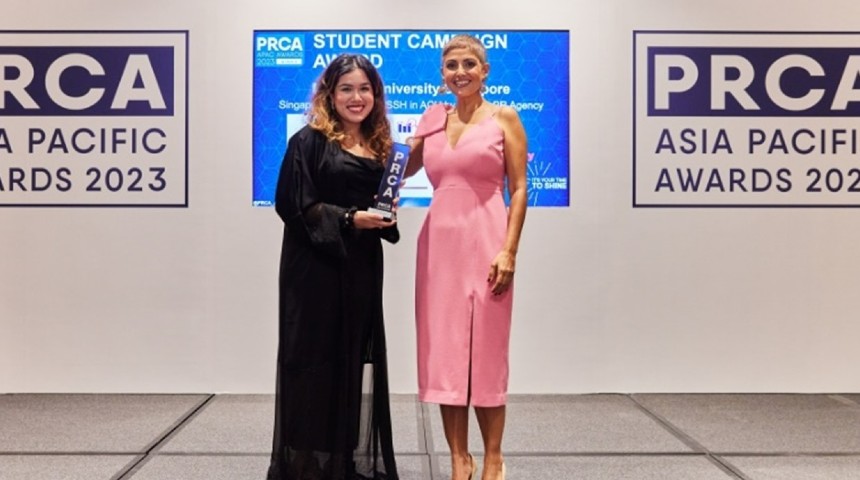 Photo caption #1: Eraj Naurain, accepting Best Student Campaign award, on behalf of sMESH, student team from Murdoch University Singapore. Photo credit: PRCA Asia Pacific.