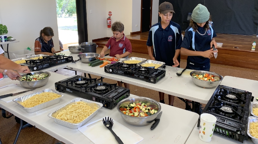 Aboriginal children participate in a cooking class