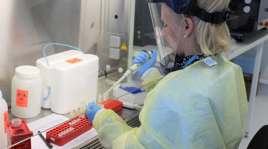 Dr Samantha Lodge, preparing COVID19 samples at the ANPC