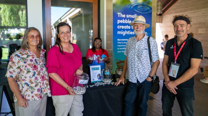 Jaki Richardson,  Ana Terrazas and Paul Hansen from The Wetlands Centre with Dr Martin Breuckner at the Open Day Giving stand