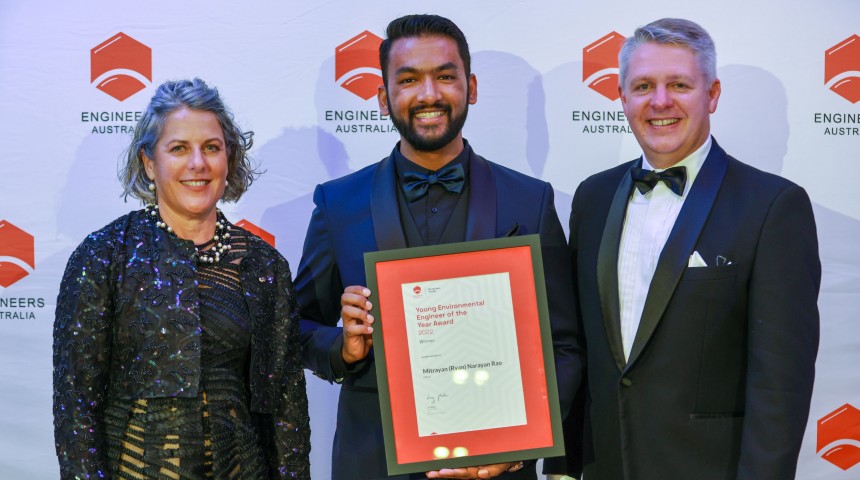 Group photo of Mitrayan (Ryan) Rao (standing in the middle holding his award) with Dr Nick Fleming (on the right) and CEO of Engineering Australia Romilly Madew (on the left)
