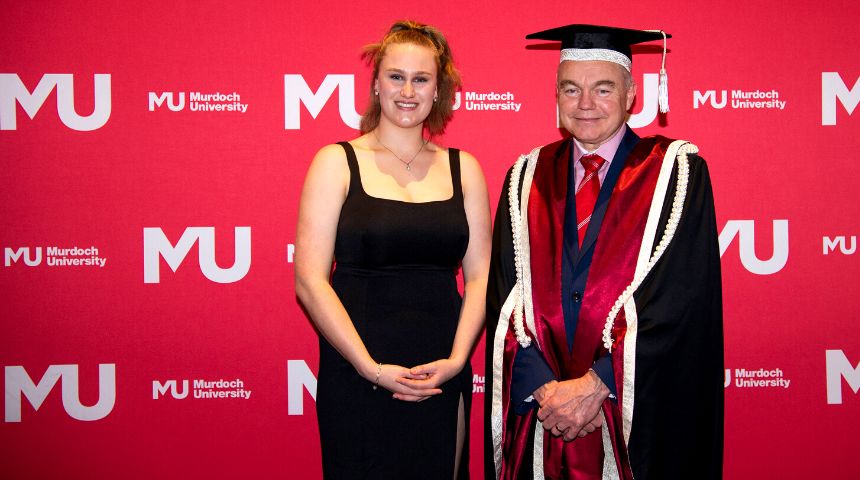 Student award winner Brianna Jane Hill, a white female with Vice Chancellor of Murdoch University Professor Andrew Deeks,  a white male wearing full university regalia