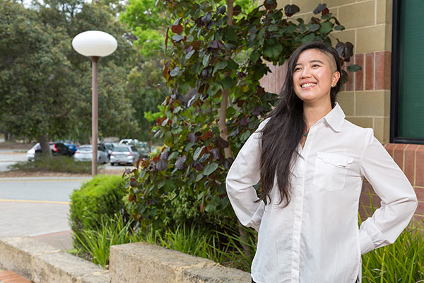 International student Chantal Ng posing and smiling at Murdoch University 