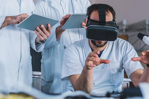 Medical professional in lab with VR headset on